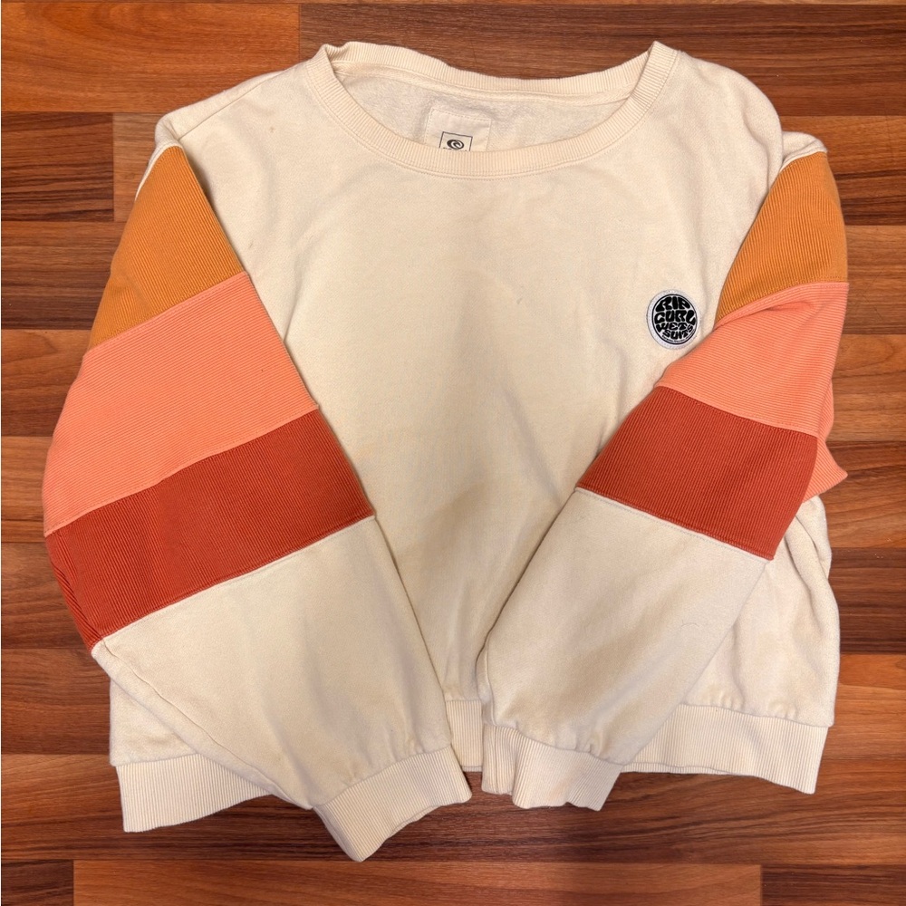 Rip Curl Cream Crewneck Sweater with Orange, Peach & Rust Colorblock Sleeves